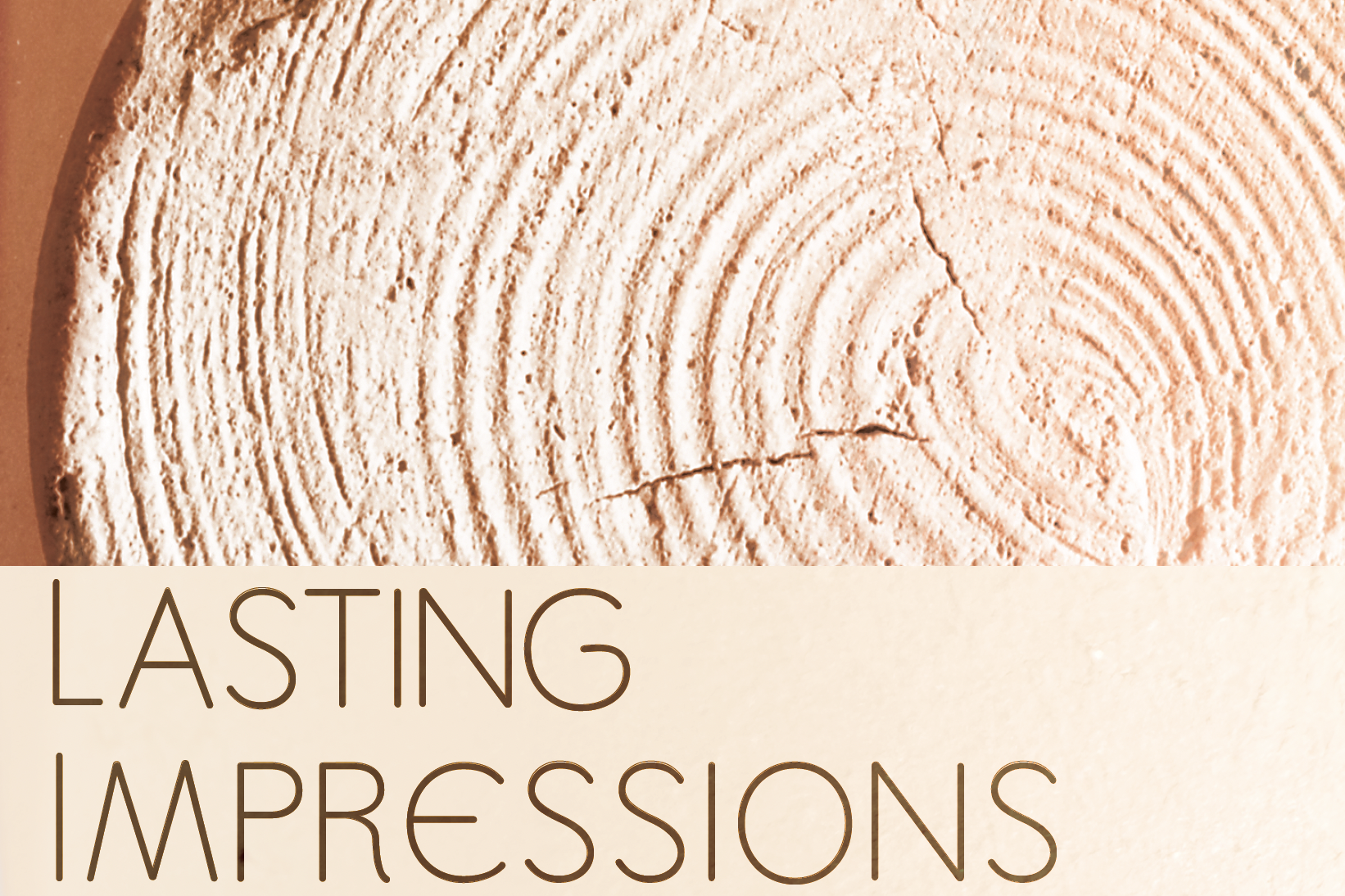 Close-up of a textured clay or plaster sculpture with concentric circular ridges resembling tree rings, with the words "LASTING IMPRESSIONS" in thin, elegant lettering across the bottom.